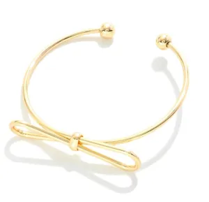 Gold Tone Cuff with Bow